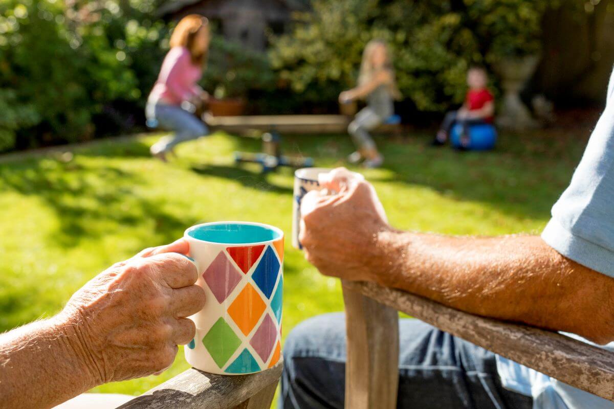 family-playing-in-grandparents-backyard