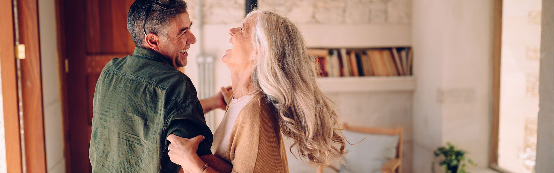 older-couple-dancing-and-laughing older-couple-dancing-and-laughing