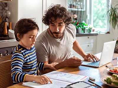 dad-helping-son-with-homework dad-helping-son-with-homework