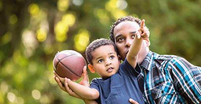 father-son-play-football