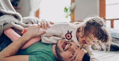 dad-and-toddler-playing-and-laughing