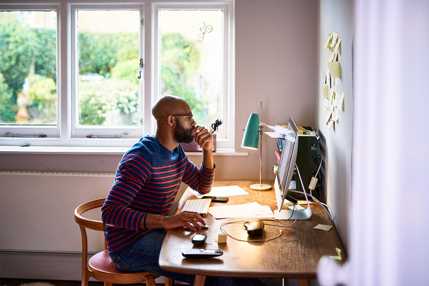 Man on laptop at home